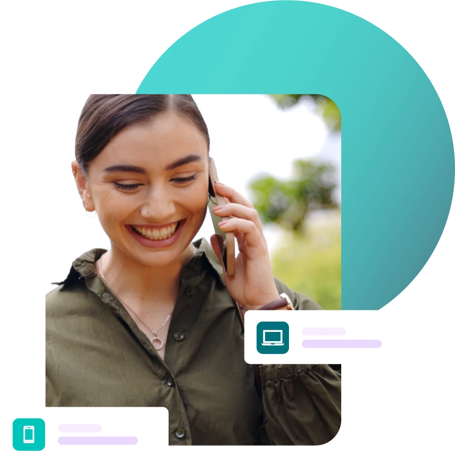 Lady walking outdoors on a call with a mobile phone smiling